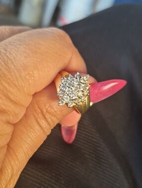 14k Gold Ring Surrounded  By 2k Diamonds. Size 8.
